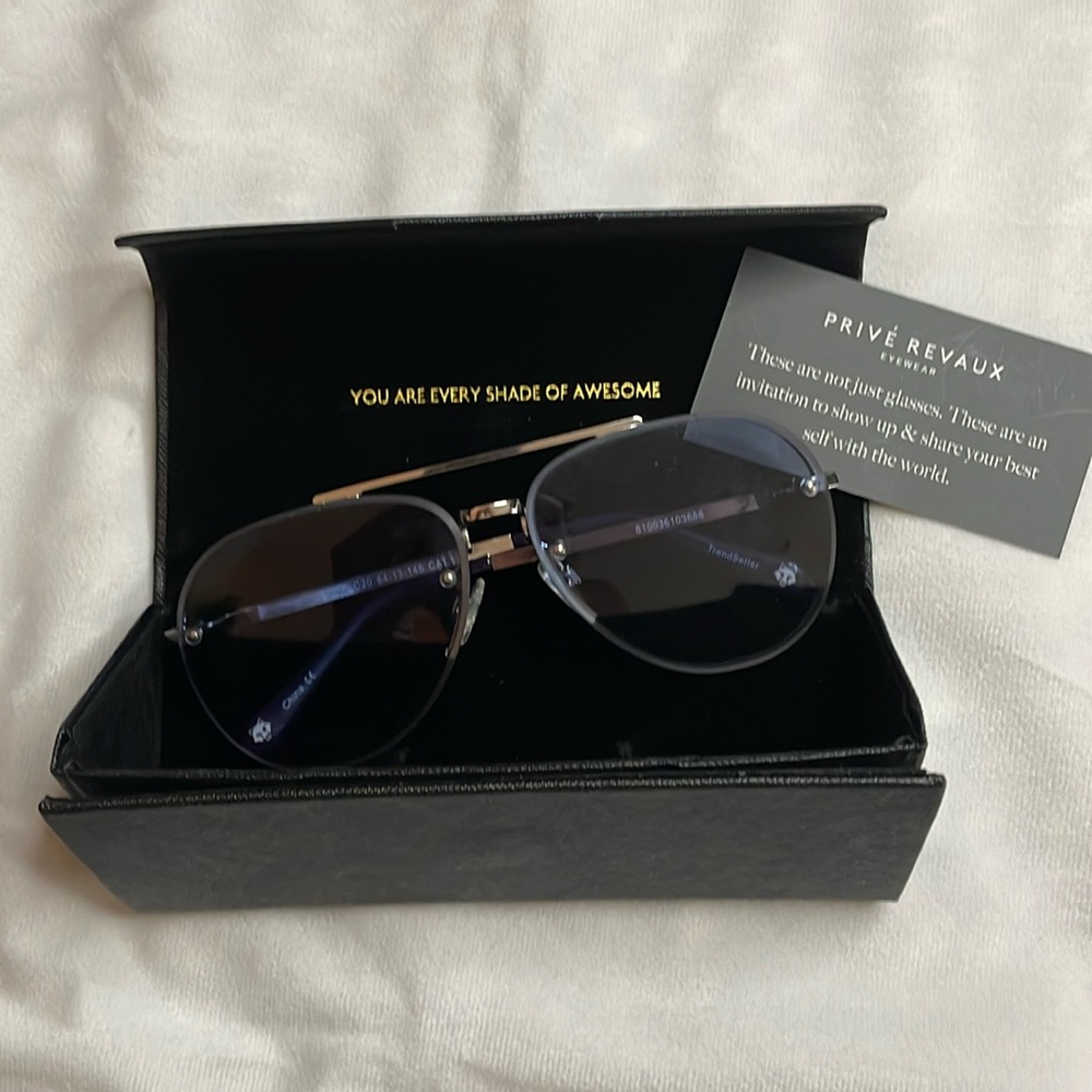 NWOT. Privé Revaux Aviator sunglasses. Blue lens. Silver.